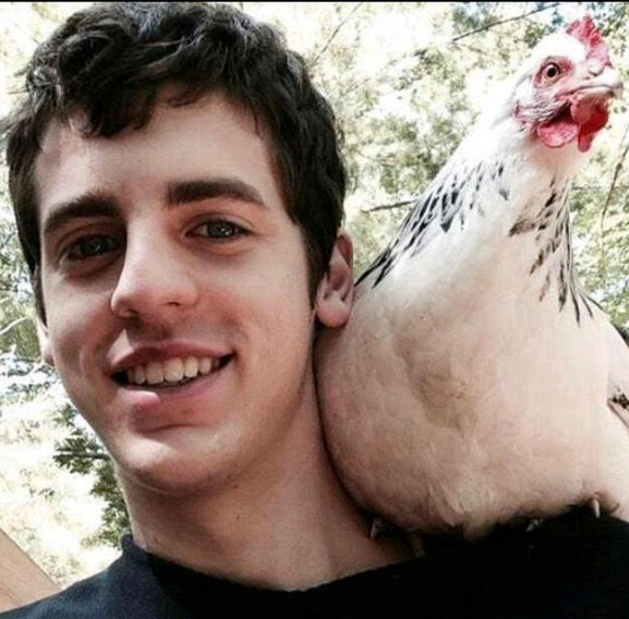jacob with a chicken on his shoulder